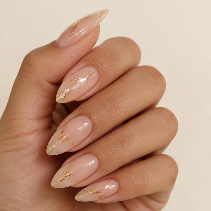 Nude almond nails with gold foil