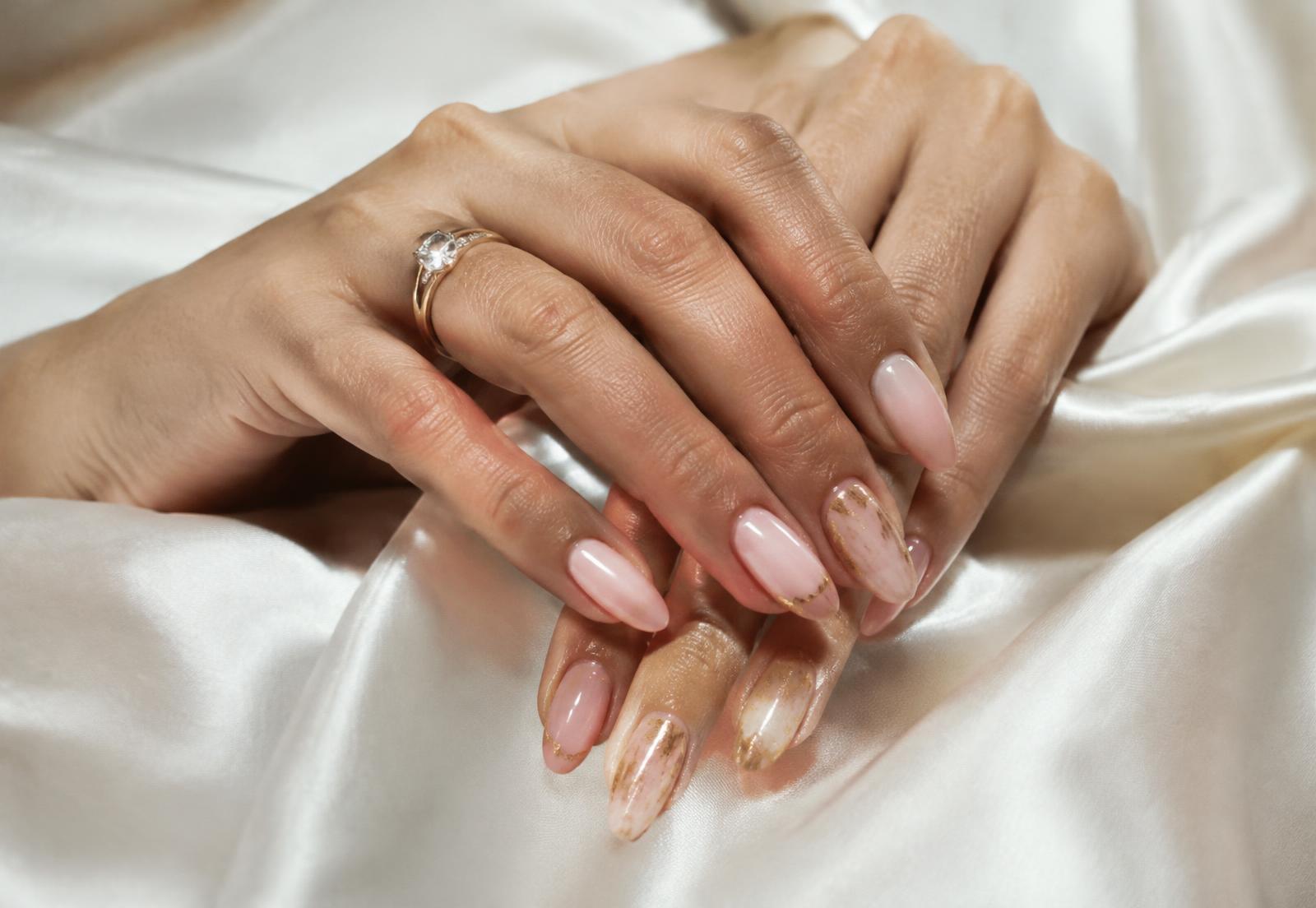 Blush pink and gold manicured nails
